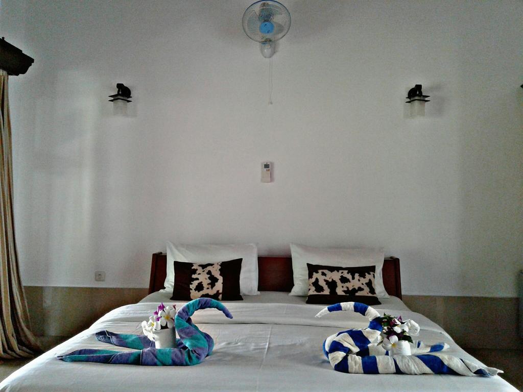 Malino Homestay Гили Траванган Экстерьер фото